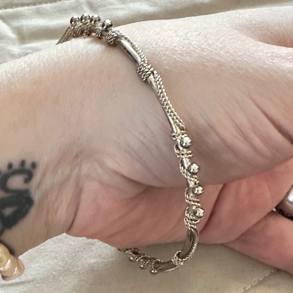 2/$20 Vintage, Silver tone, Tribal Wire Wrap decorative bangle bracelet. - Picture 6 of 11